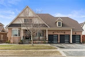 Brick covered front porch railings three-garage