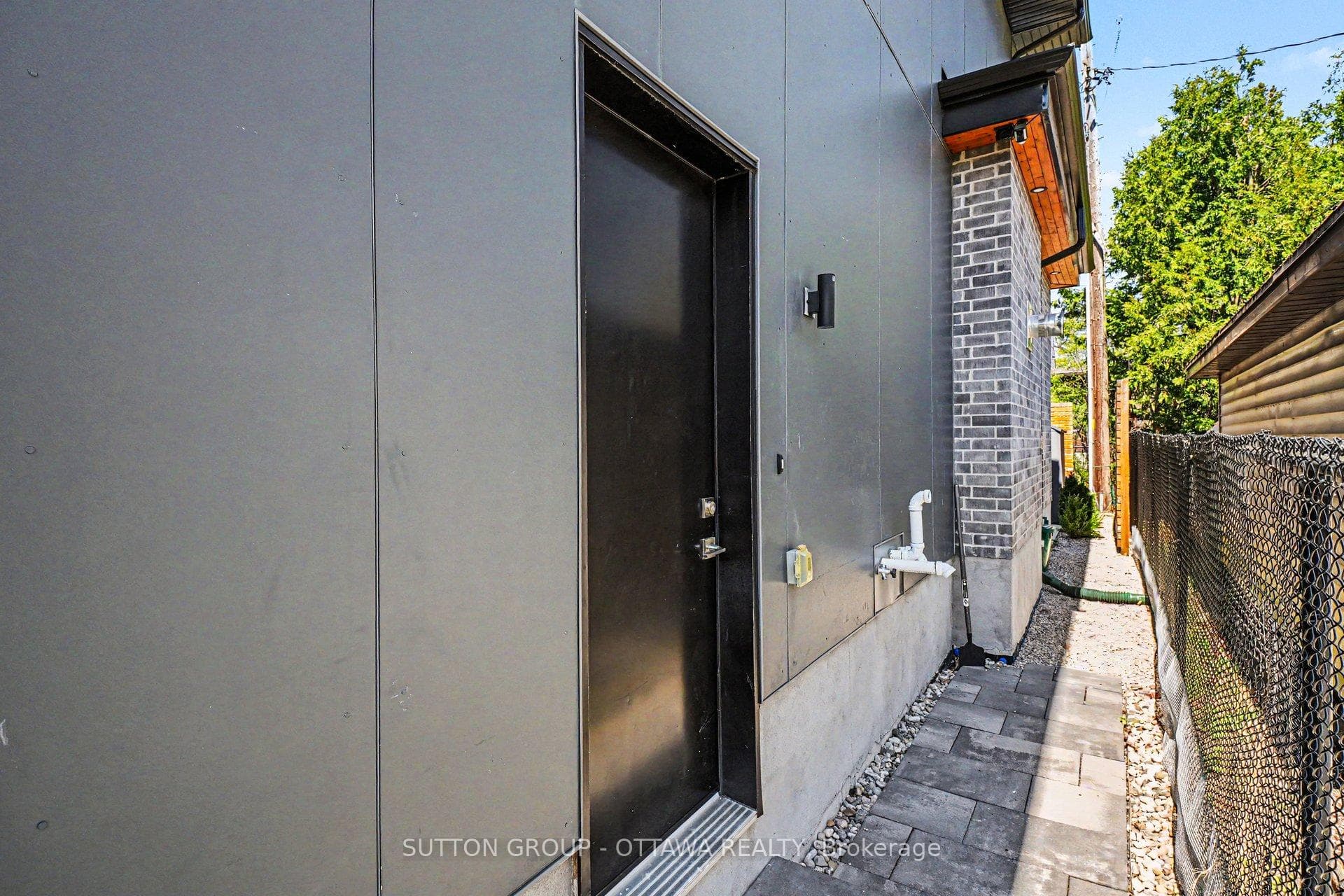 private side entrance leading to lower level unit