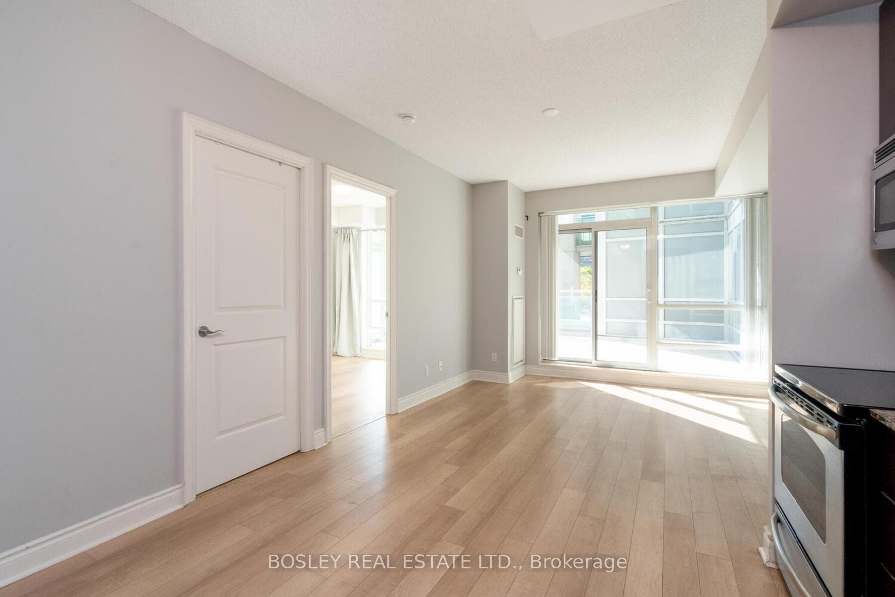 sun-drenched living room & w/o to private terrace