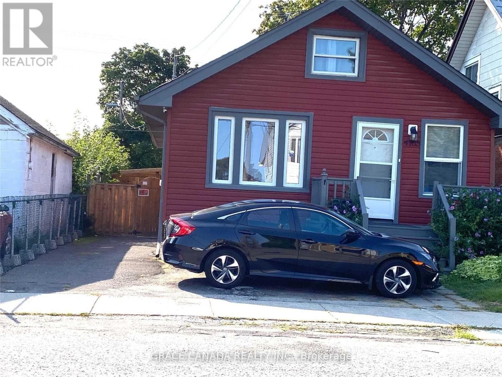 Main Entrance with Front and side Parking spots