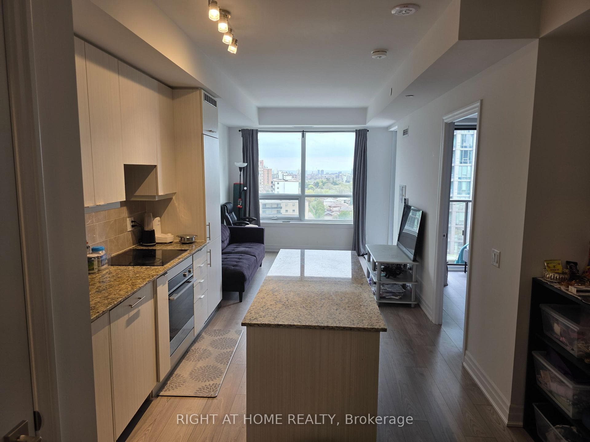 Open Concept Dinning & Kitchen Leading into Living
