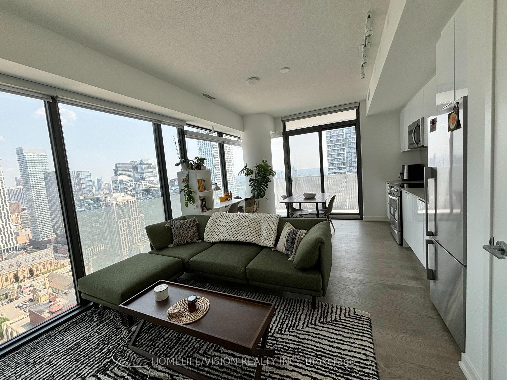 Wrap-around windows showcasing amazing city views