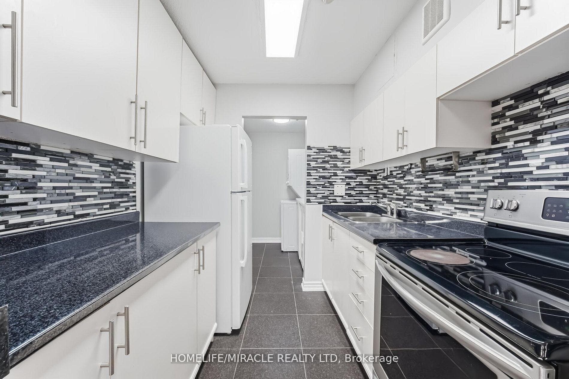 140 Ling Road Unit 103, Rouge / Port Union / Malvern, ON M1E 4V9 - Photo 1