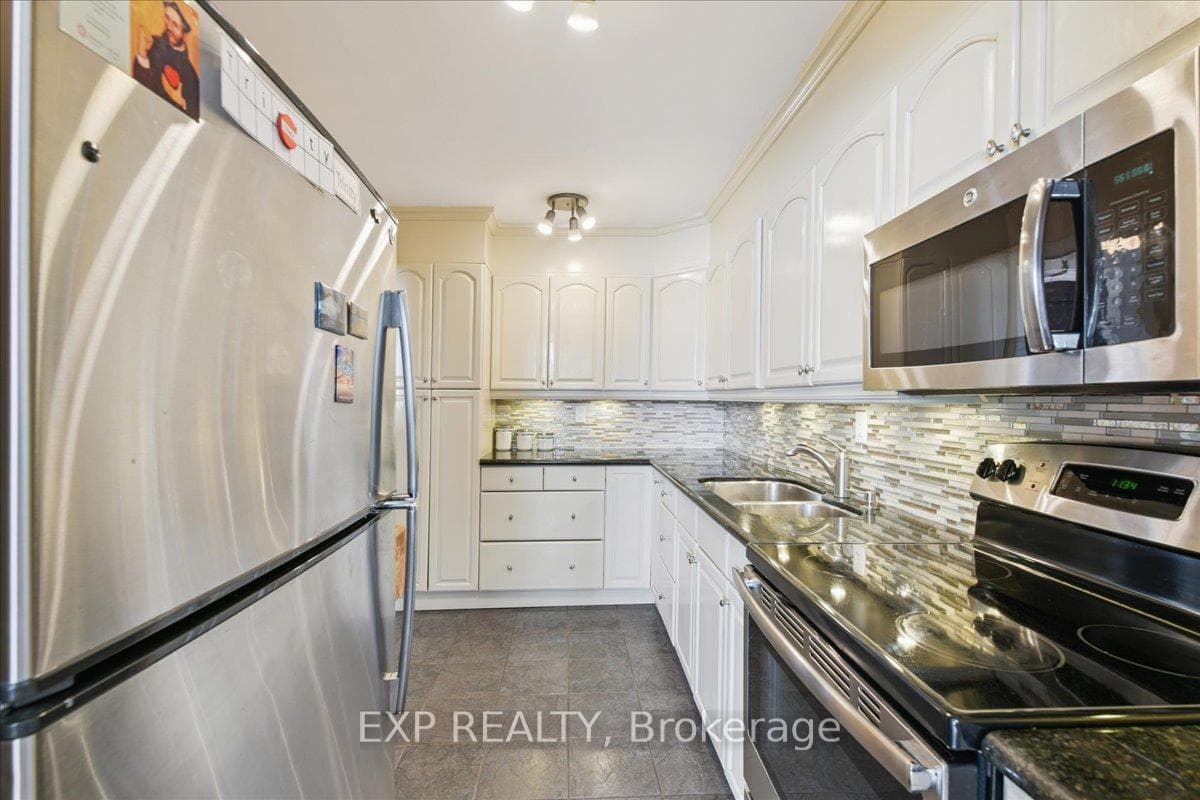 44 Longbourne Drive Unit 412, Etobicoke (Kingsview Village / Humber Heights), ON M9R 2M7 - Photo 1