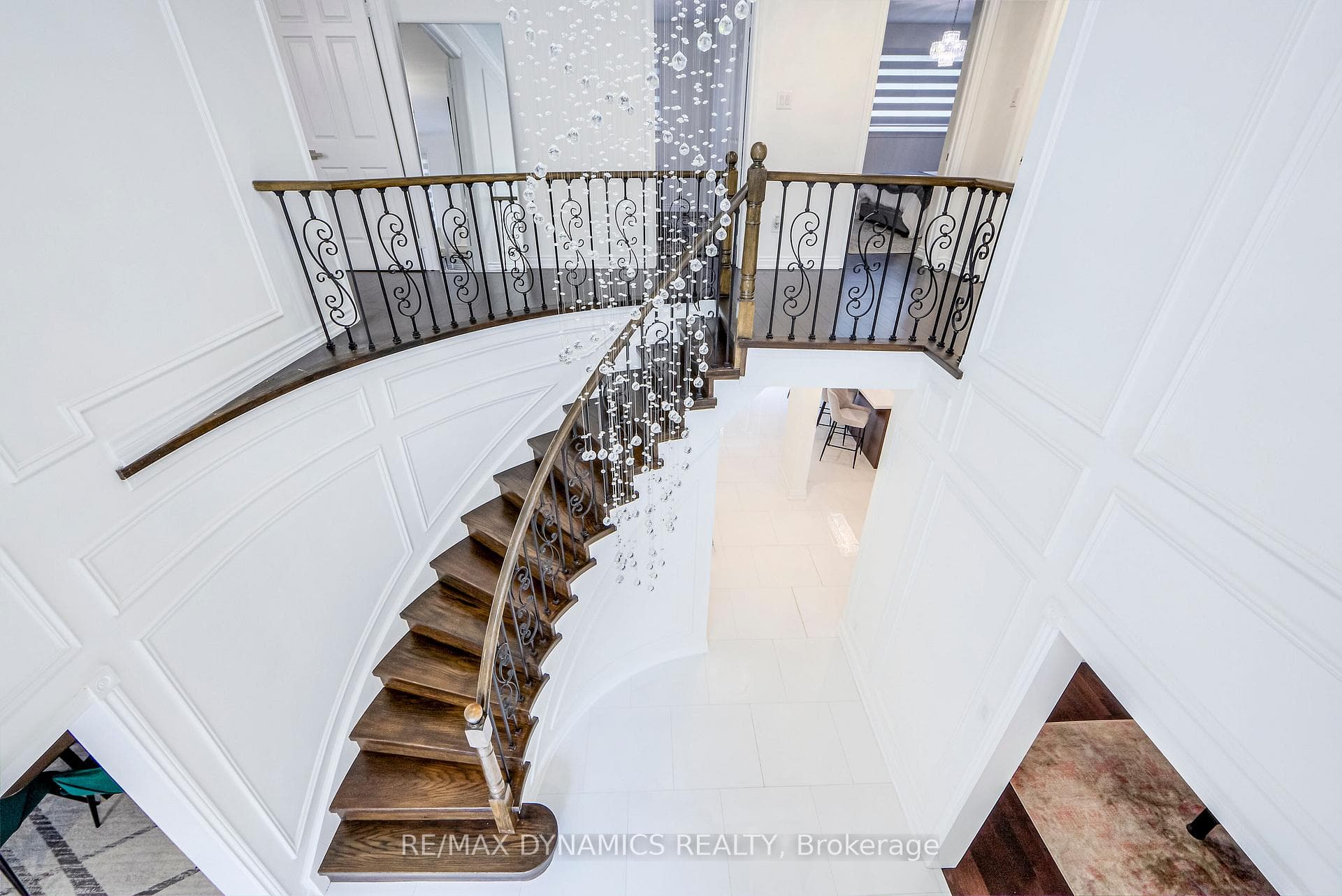 An Elegant Curved wooden staircase Railings