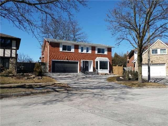 Sunny, wide lot, driveway