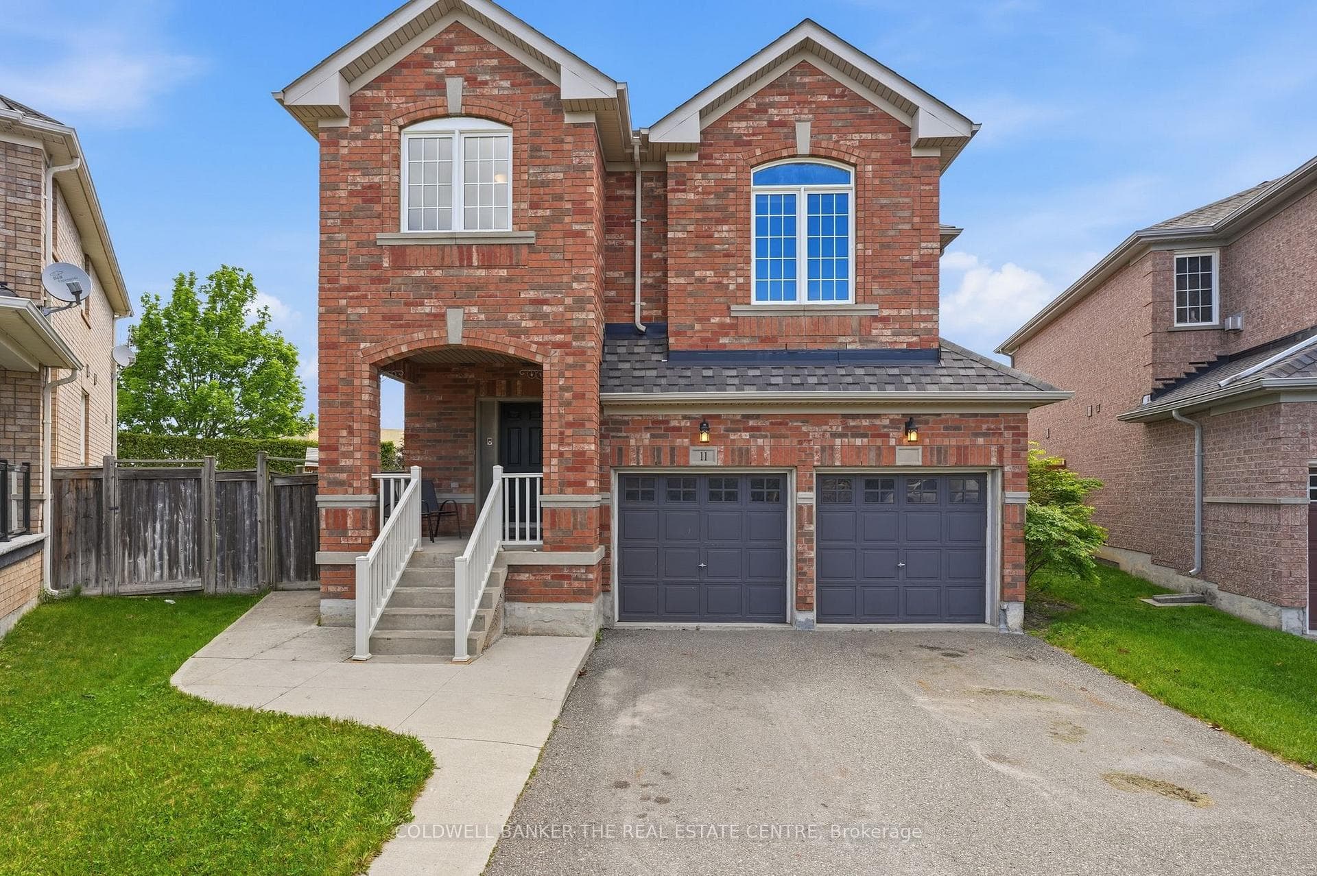 Front View Porch and Double Car Garage