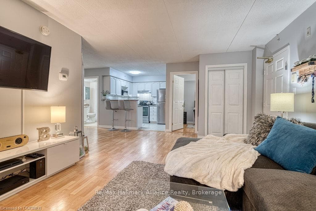 1411 WALKERS Line Unit 108, Burlington, ON L7M 4P4 - Photo 1