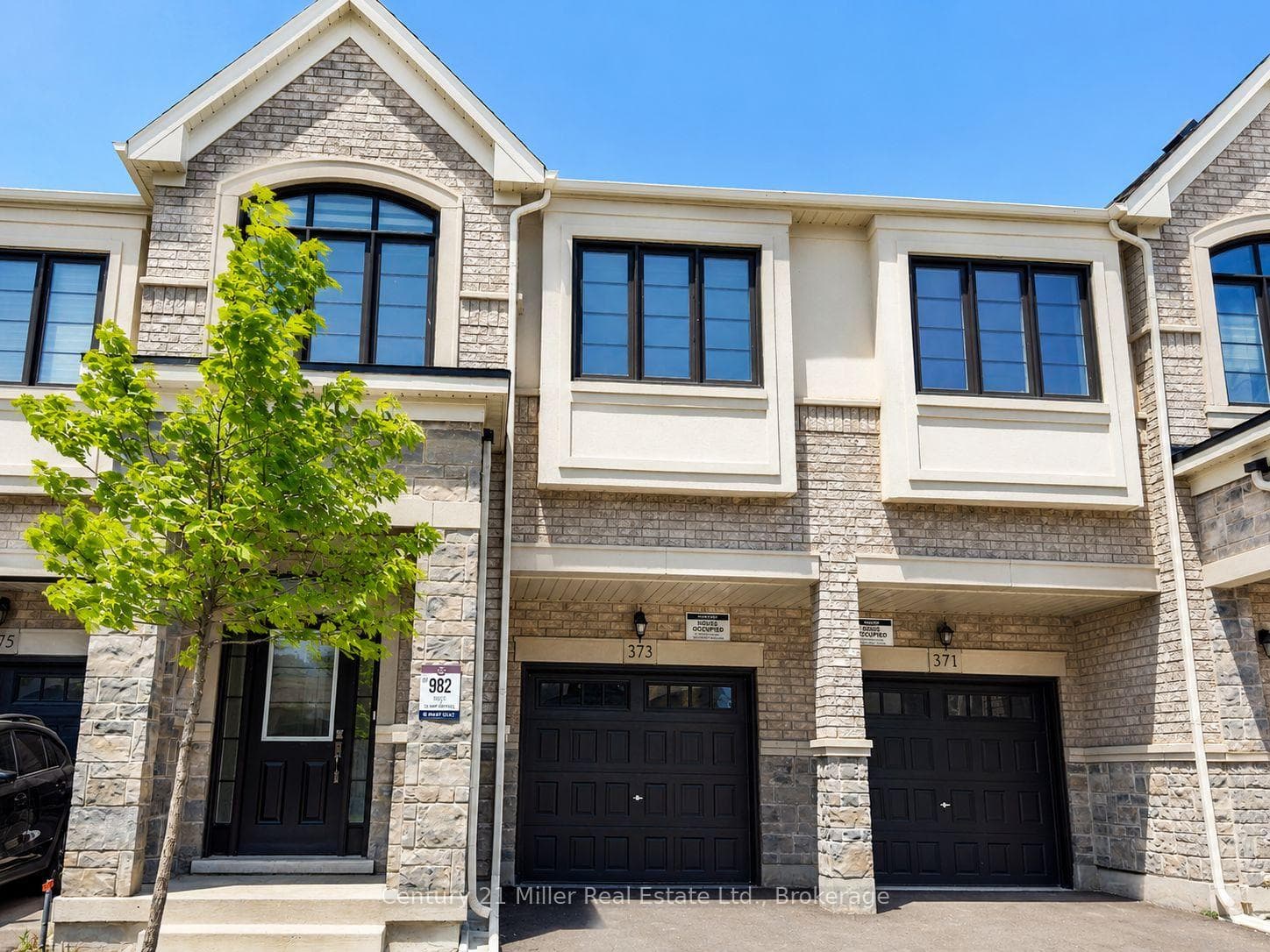 Stunning curb appeal on a premier street in Milton