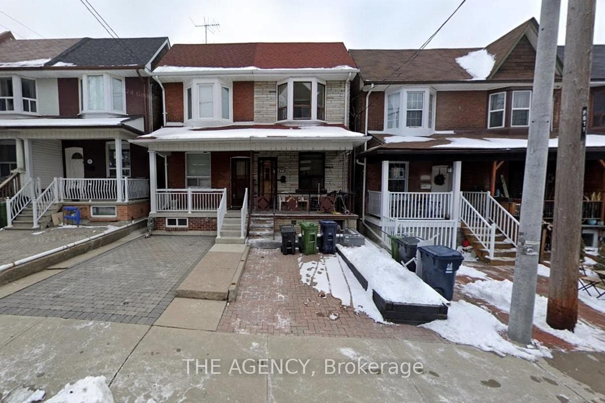 Semi-detached with paved front yard