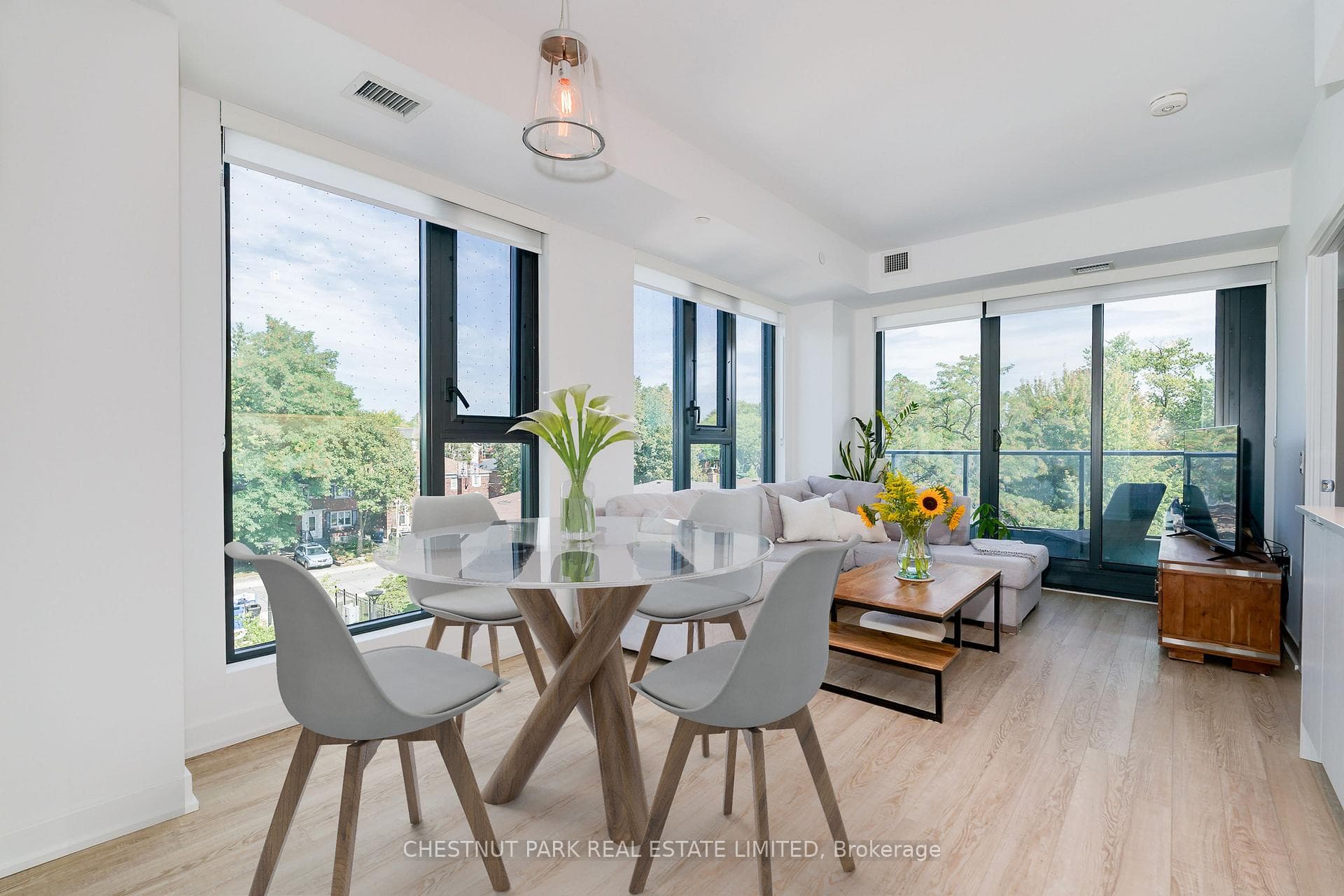 Northeast-facing 2-bed + den, 2-bath corner suite